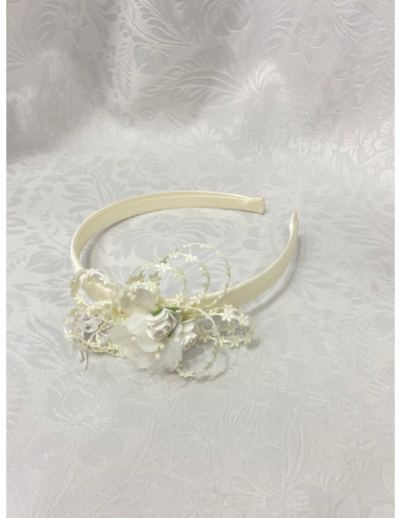 Diadema beige con flor